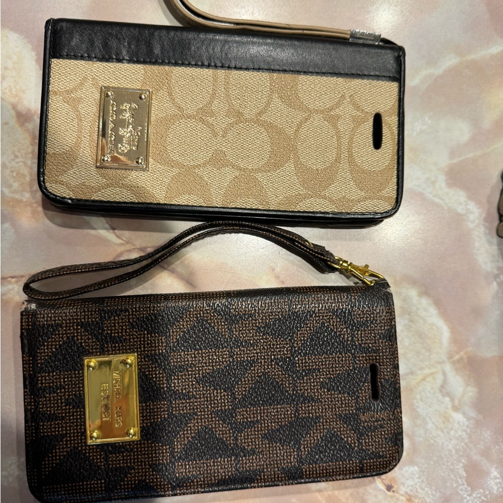 iPhone 7Plus cell phone cases. Coach and Michael Kors good condition bundle of 2